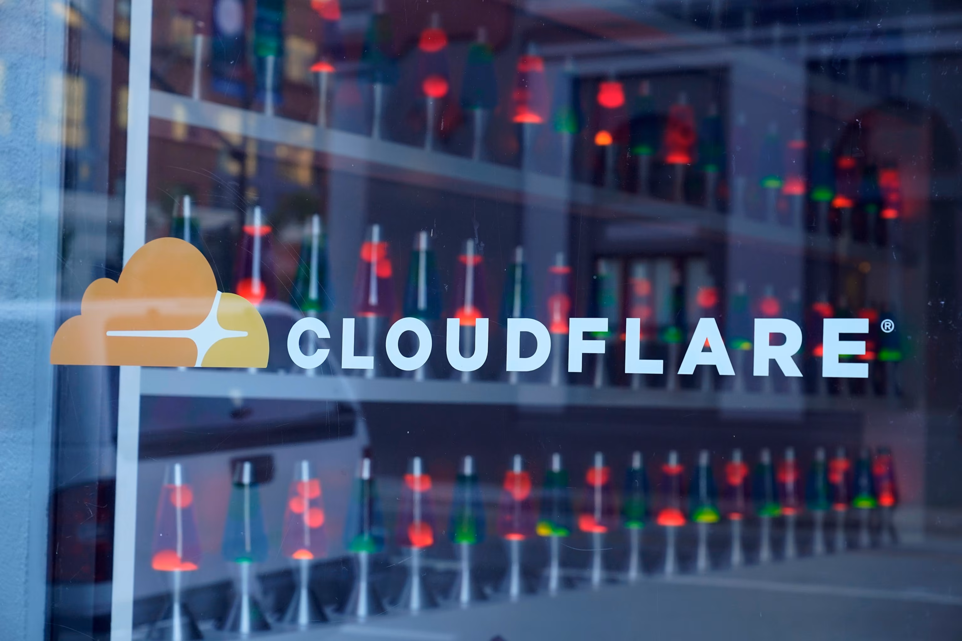 1:28 Lamps are seen through a lobby window at Cloudflare's headquarters in San Francisco, Aug. 31, 2022. Eric Risberg/AP Cloudflare outage disrupts access to some popular websites - INFBusiness